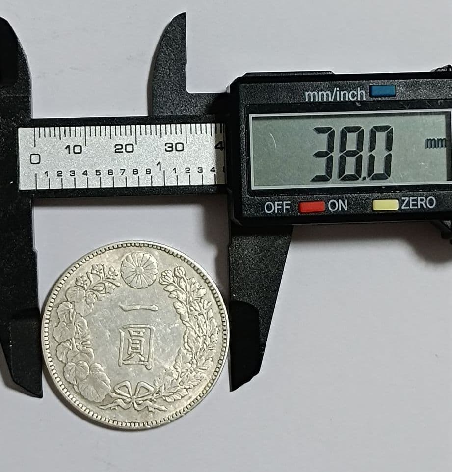 銀貨 明治三十九年 龍一圓 直径38.0mm 厚み2.5mm 重量26.85ｇ