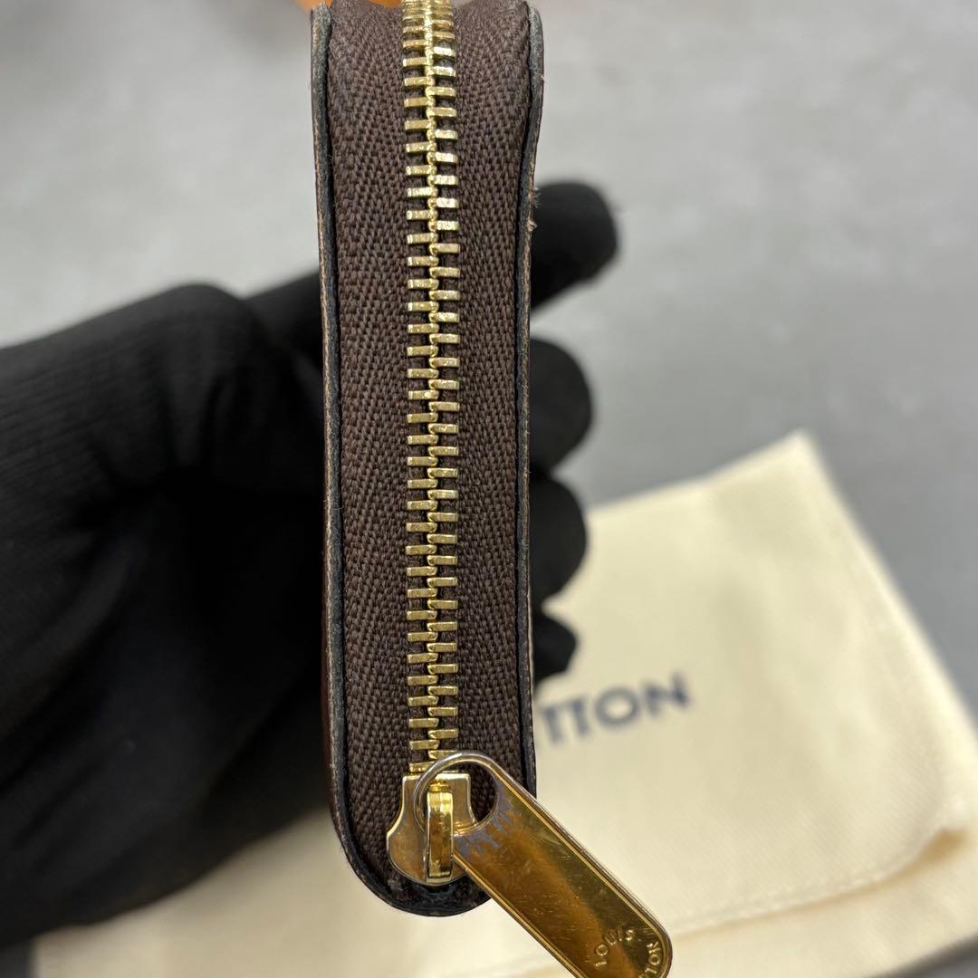 YUNO　ジャイアントモノグラム ジッピーケース M69354