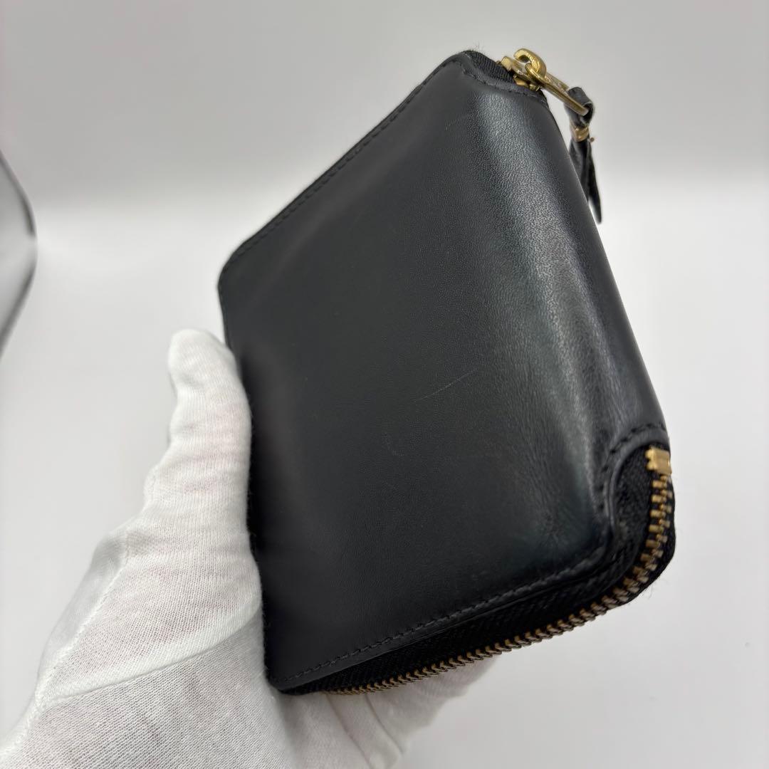 美品　comme des garcons 二つ折り財布　ブラック　ラウンドジップ