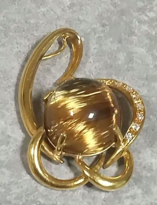 14.50ブラウンルチルキャッツアイダイヤ0.07入りk18ペンダントトップ