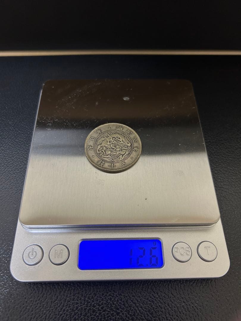 Nana 一円銀貨と50銭銀貨