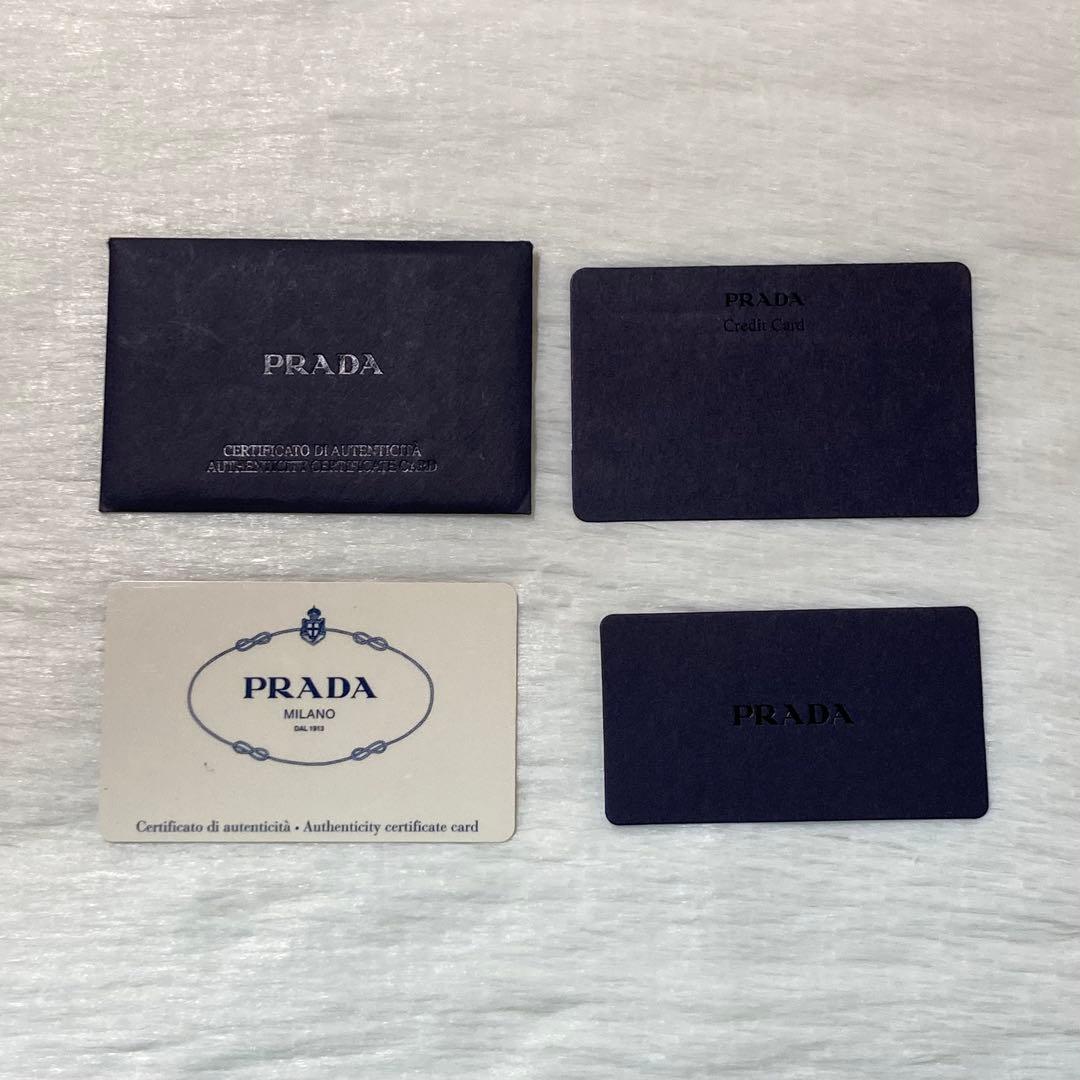 早い者勝ち　PRADA プラダ　二つ折り　レザー　ナイロン　財布　折り財布　黒