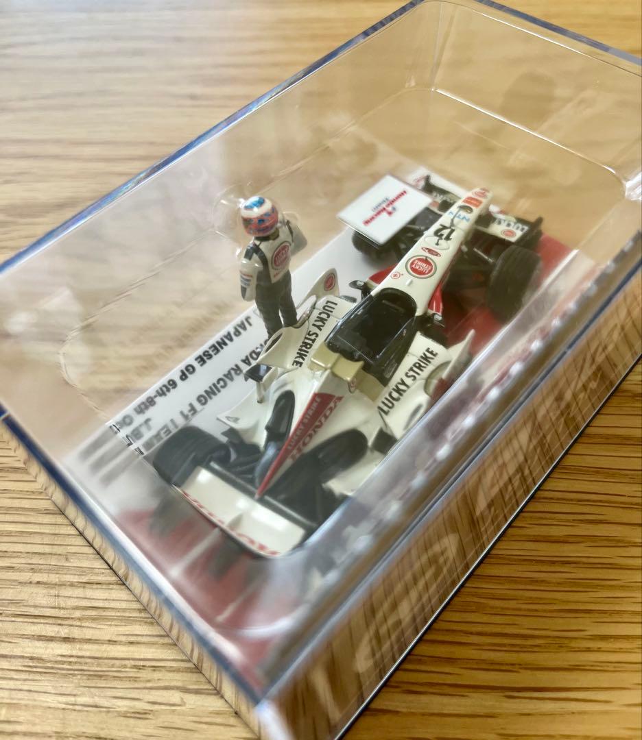 ミニチャンプス F1 ホンダレーシングRA106 J.バトン '06年 日本GP