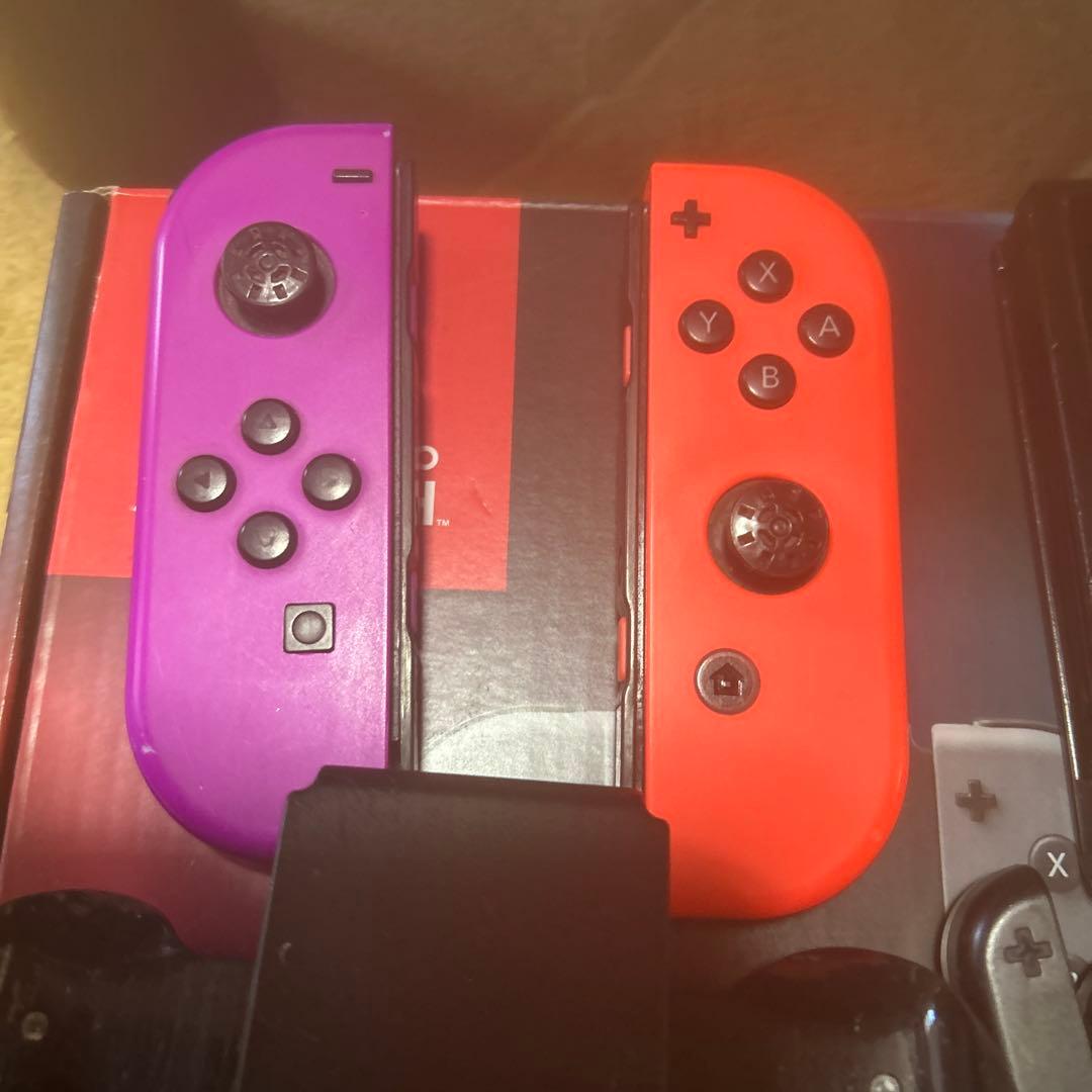 Nintendo Switch 本体 紫とオレンジのジョイコン付き