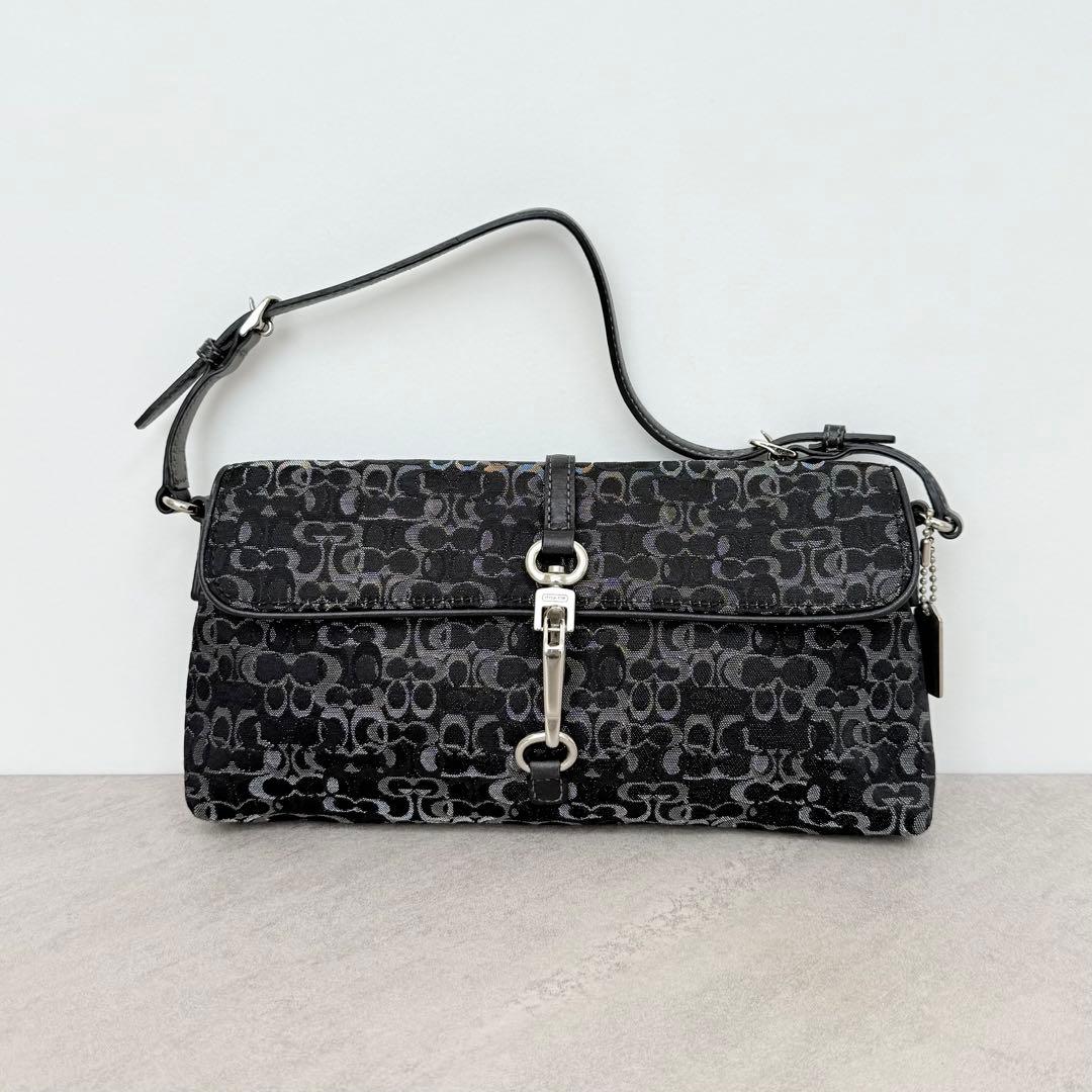 バッグ Coach Black Signature Soft Clip Pouch