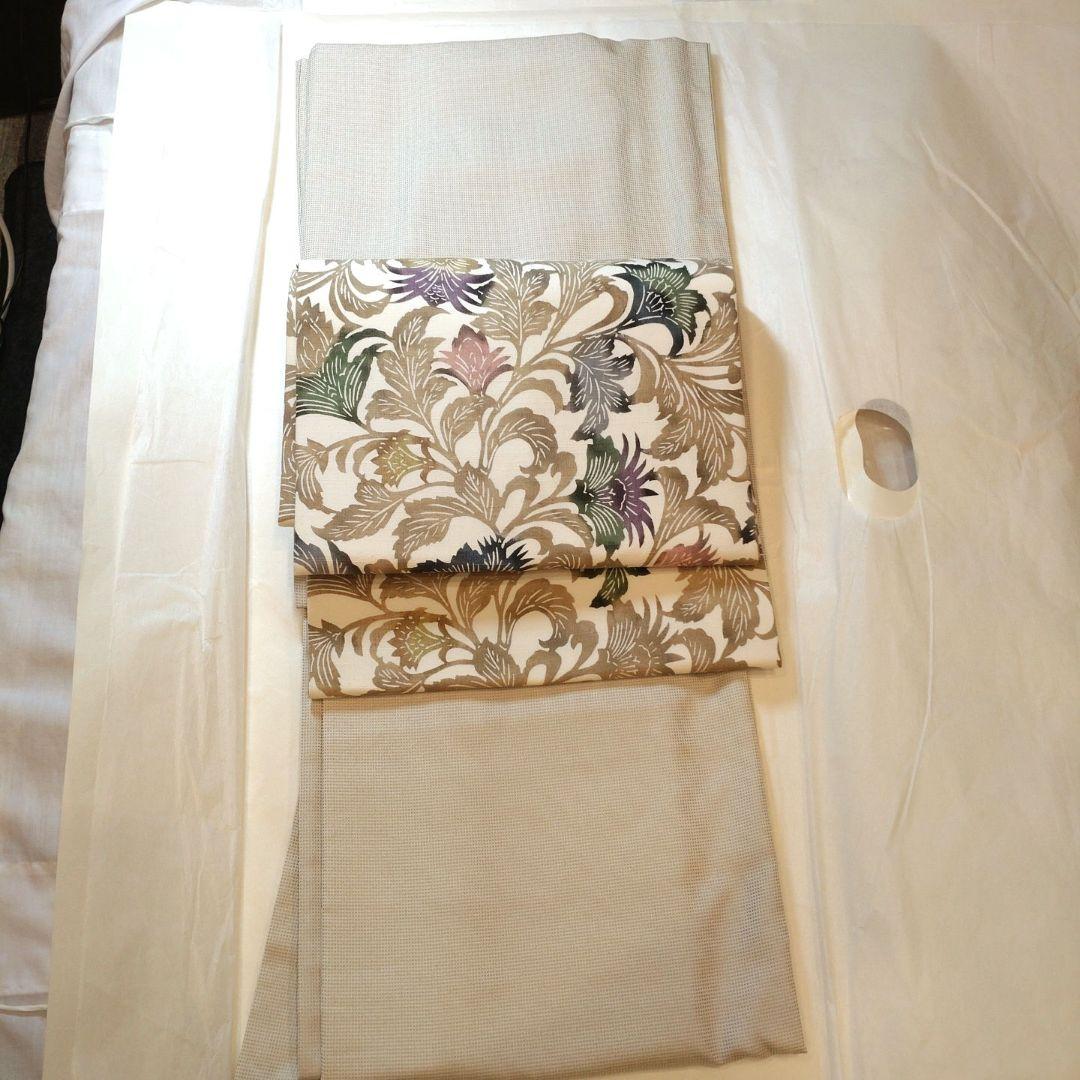 西陣御召　角通し柄　薄い抹茶色　袷　余り布あり　パールトーン加工済　着物のみ