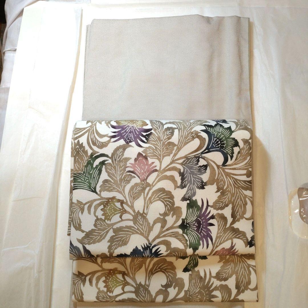 西陣御召　角通し柄　薄い抹茶色　袷　余り布あり　パールトーン加工済　着物のみ