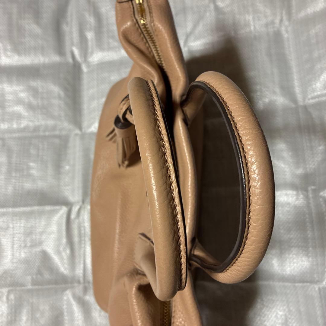 くまちゃんToryBurchピンクベージュハンドバッグタッセル付き