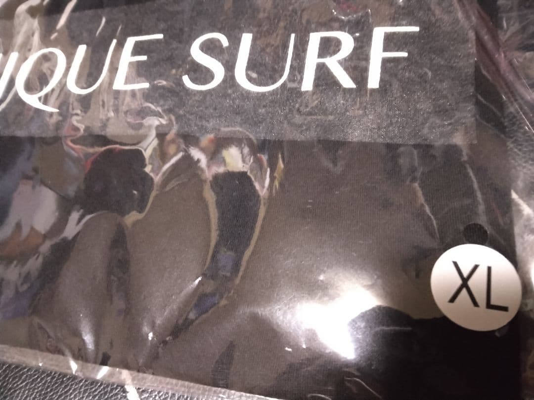 ザライジングサンコーヒーXLサイズ　UNIQUE SURF TEE　BLACK