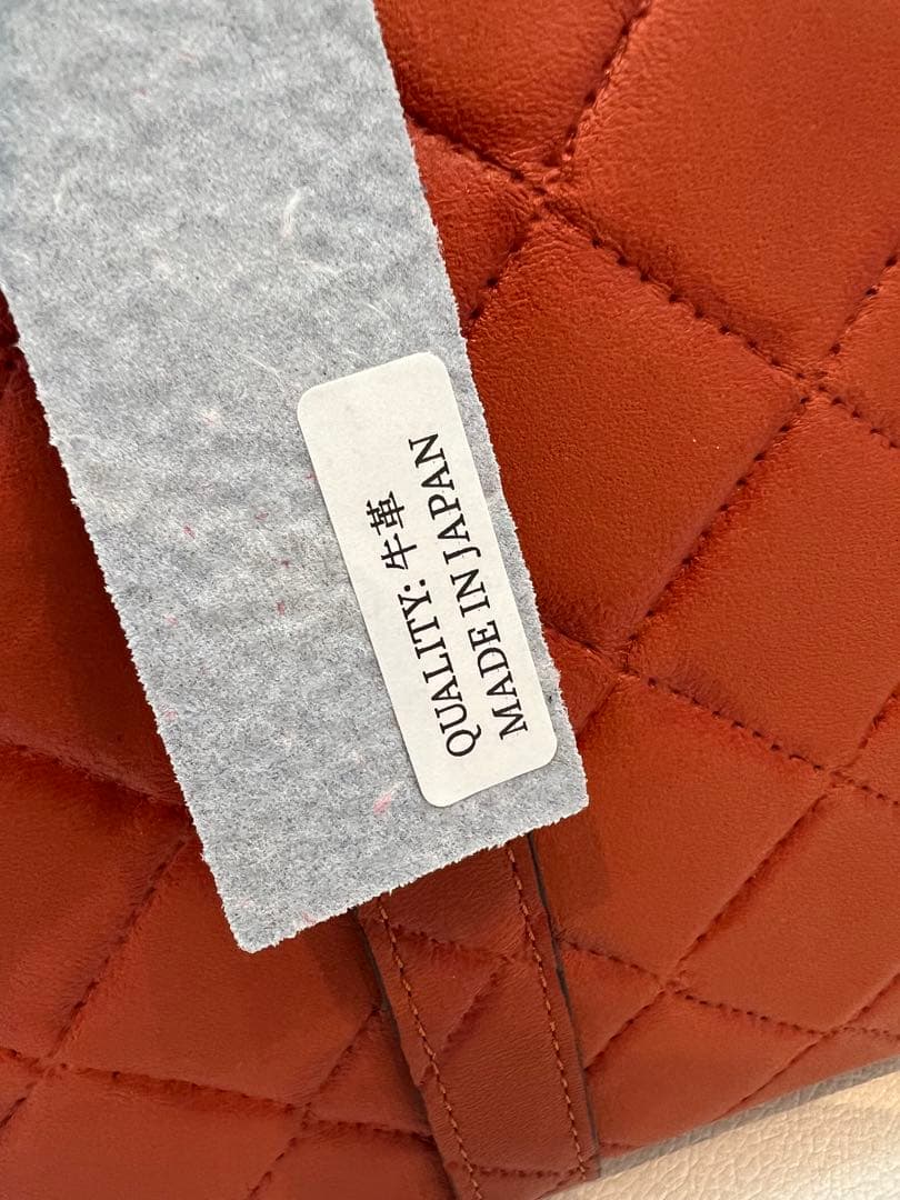 MUL 本革　限定カラーオレンジ　キルティング ハンドバッグ