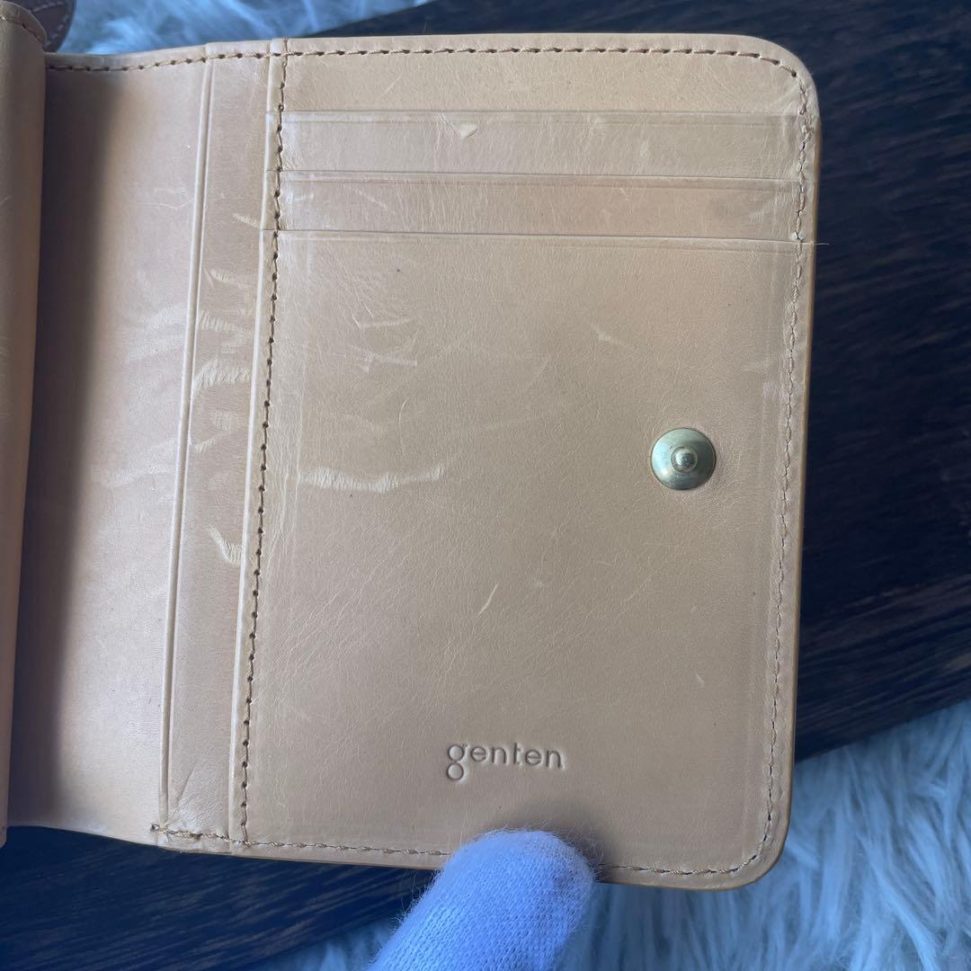 【極美品】ゲンテン フラッターカットワーク 二つ折り財布 ヌメベージュ