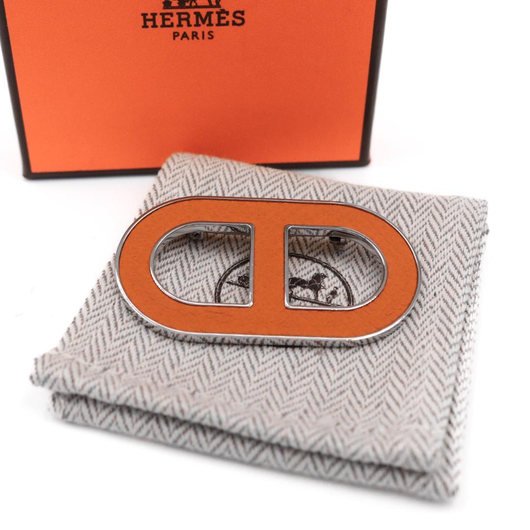 HERMES ダブルDロゴ ブローチ オレンジ
