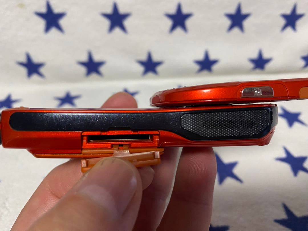 SO505iS オレンジ 回転式 携帯電話