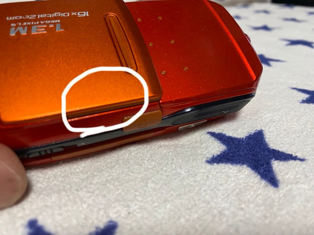 SO505iS オレンジ 回転式 携帯電話