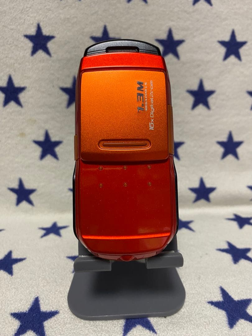 SO505iS オレンジ 回転式 携帯電話