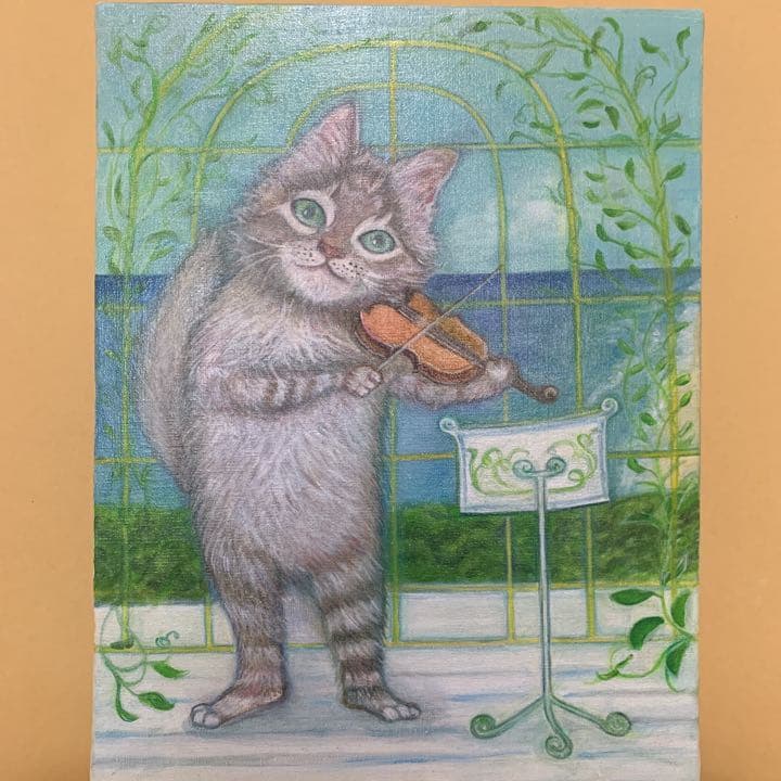 バイオリンのお稽古をする猫