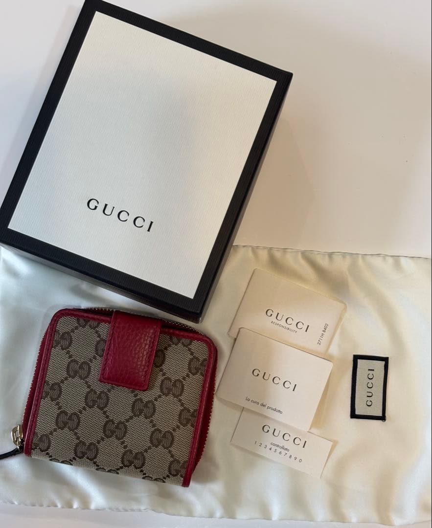 GUCCI GGパターン 二つ折り財布コンパクトウォレットラウンドジップ