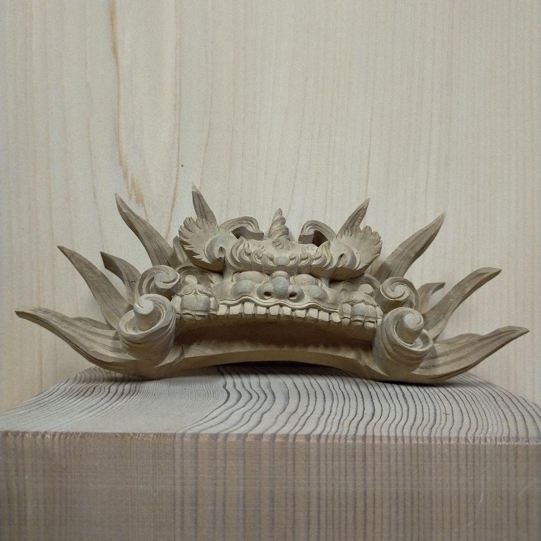 獅噛み白檀彫刻