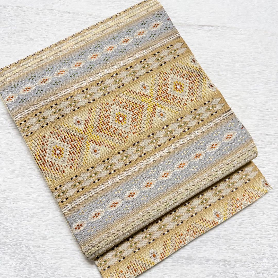 m-22 本場琉球 島花織 幻想雪輪文 袋帯 正絹 2通り 両面 未使用