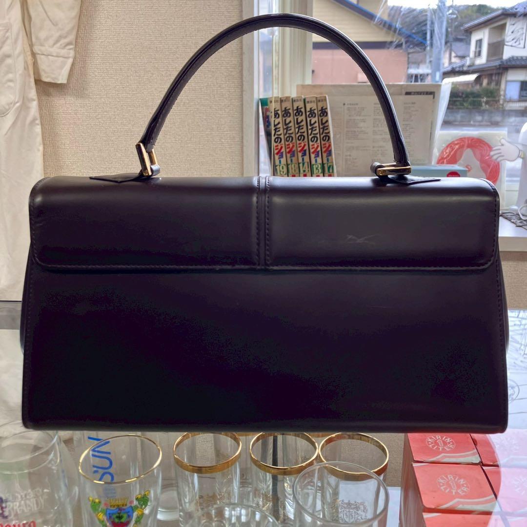 る*る様 未使用　イヴサンローラン　ロゴ金具　ダークブラウン　ハンドバッグ　長期