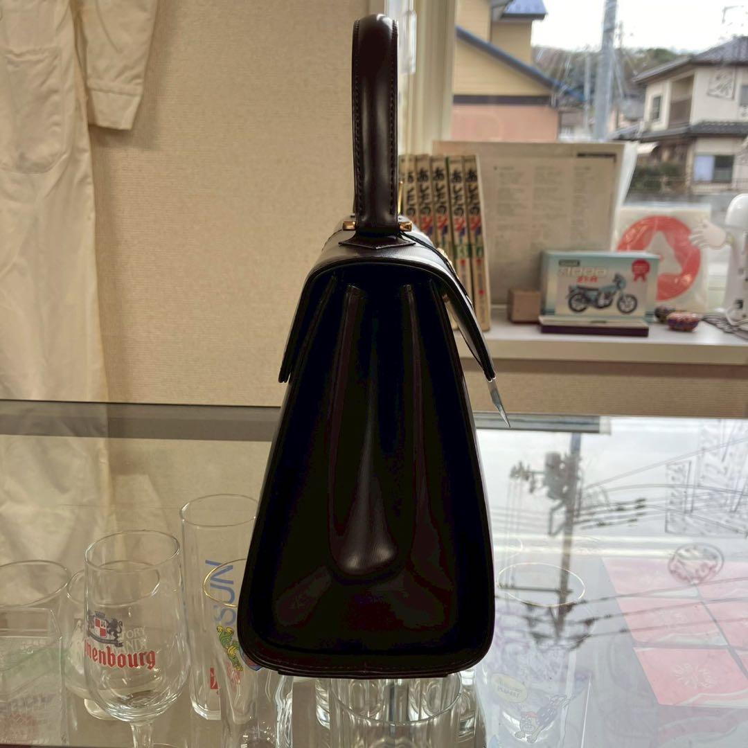 る*る様 未使用　イヴサンローラン　ロゴ金具　ダークブラウン　ハンドバッグ　長期