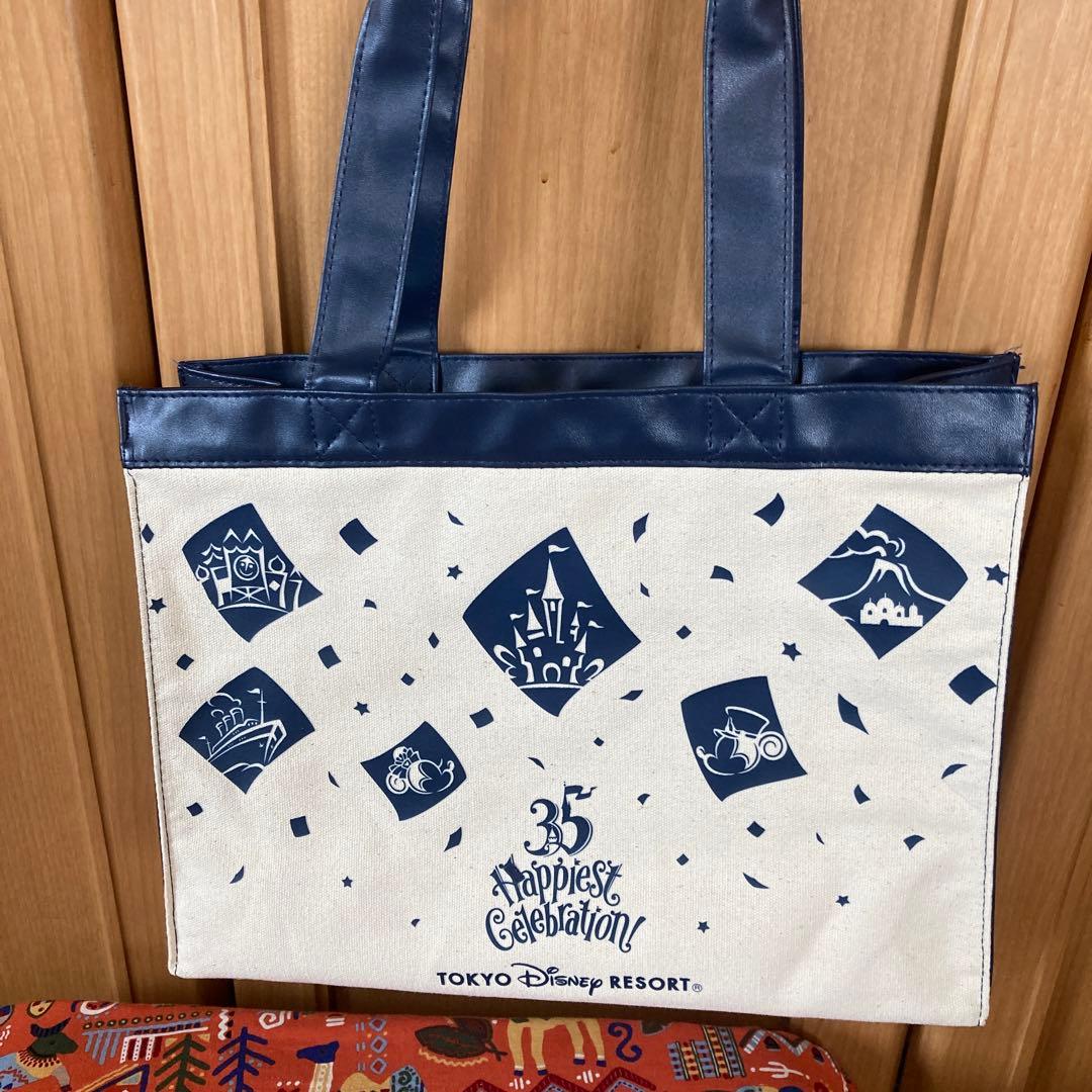 ディズニーリゾート　35周年　生成りキャンバス　紺合皮バッグ　UCC 懸賞品