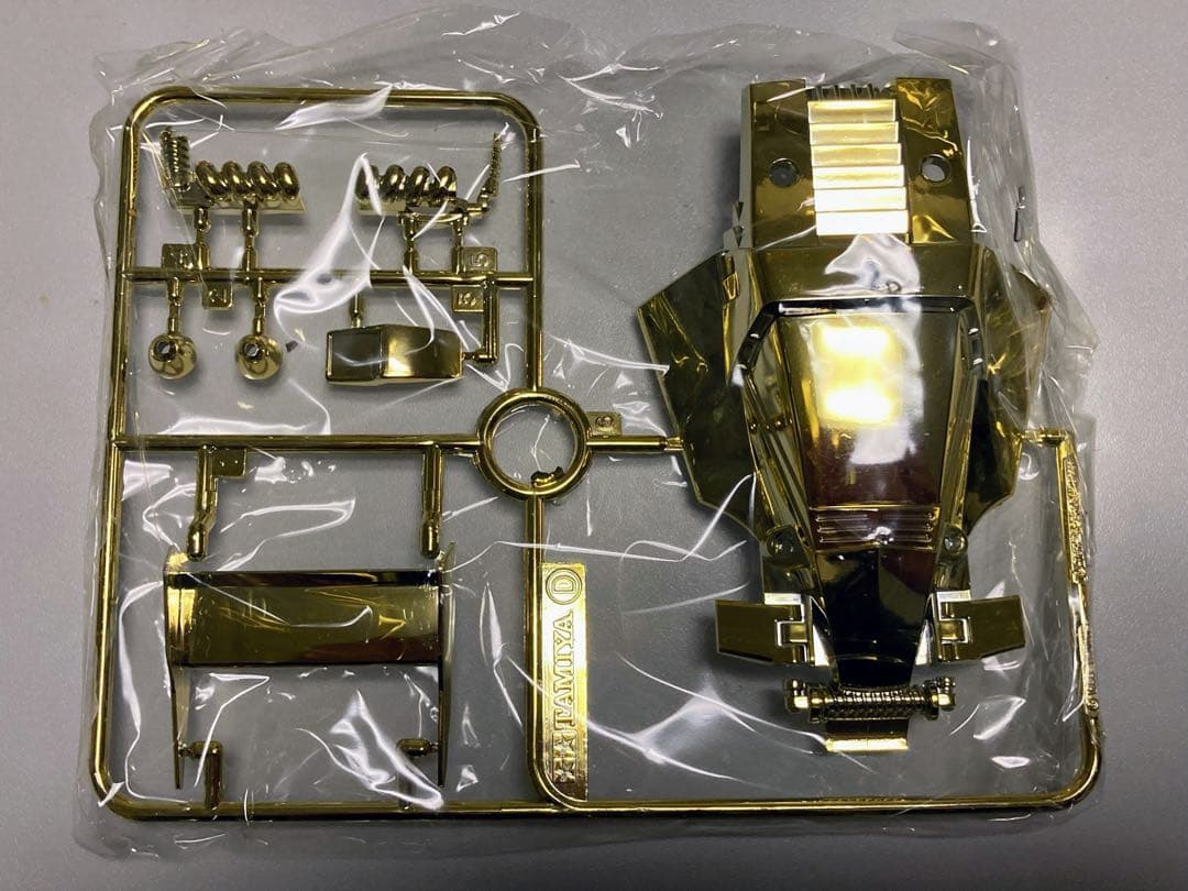 ひ*ゃ様 【お値下げ】未組立品ミニ四駆 金メッキクリアシャーシ皇帝(エンペラー)