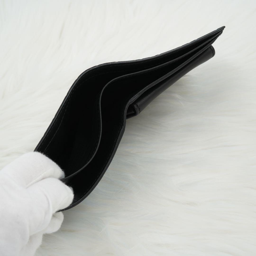 未使用品　箱付き　GUCCI グッチ　二つ折り財布　GG柄　シマ　ブラック