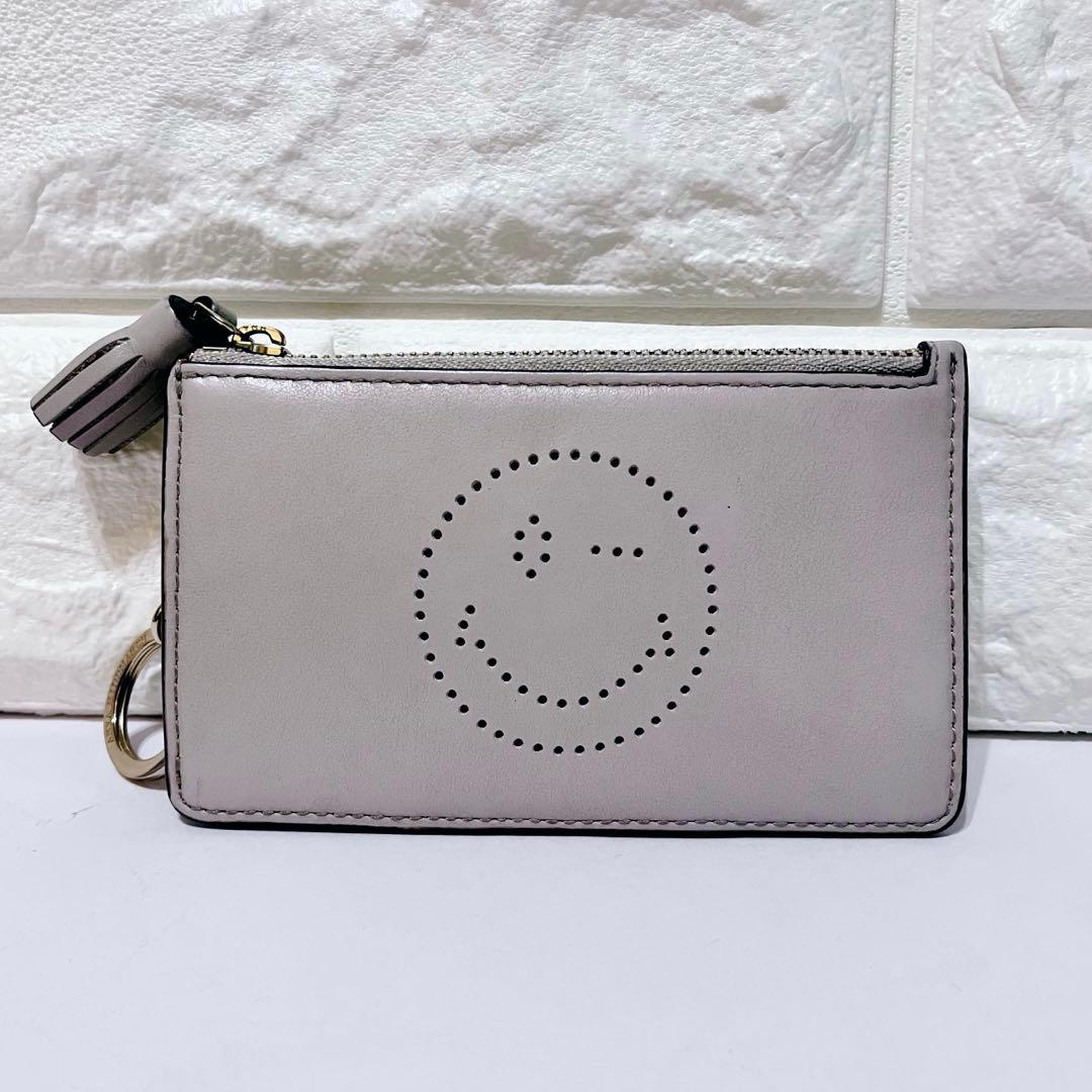 ANYA HINDMARCH スマイリーウィンキー パンチングレザーケース