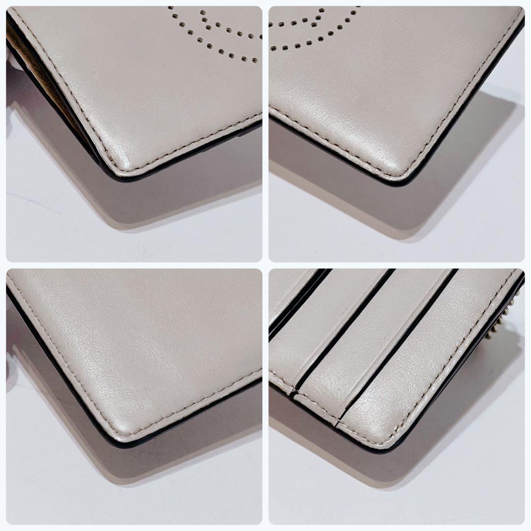 ANYA HINDMARCH スマイリーウィンキー パンチングレザーケース