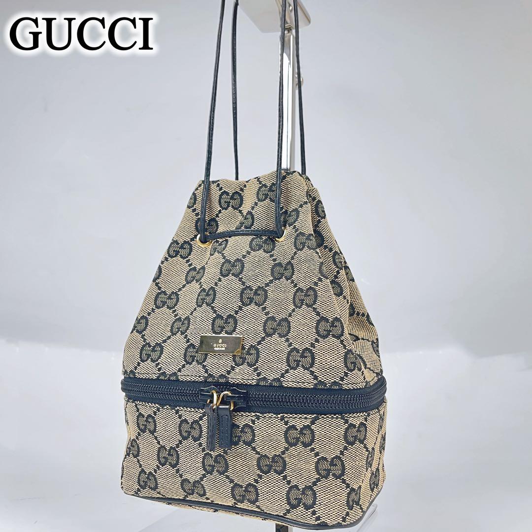 【極美品】GUCCI GGキャンバス プレート バニティポーチ 巾着 ミニバッグ