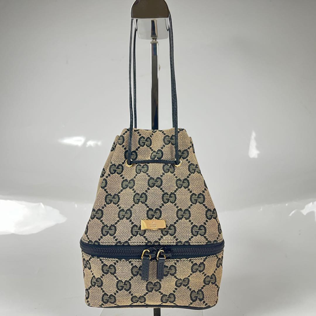 【極美品】GUCCI GGキャンバス プレート バニティポーチ 巾着 ミニバッグ