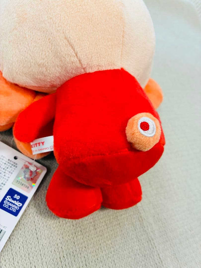 ミャクミャク サンリオ　ぬいぐるみM 推しカラー　キティ
