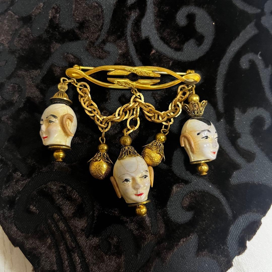 ヴィンテージ人形顔ブローチ