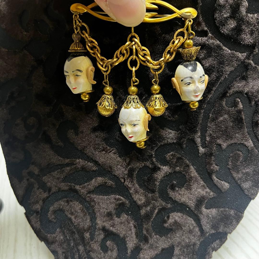 ヴィンテージ人形顔ブローチ