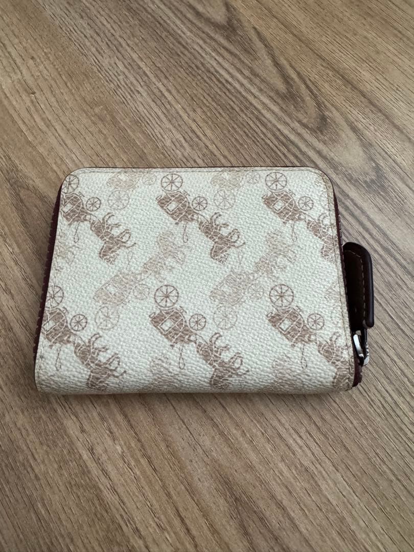 大幅値下げ中‼️‼️COACH 二つ折り財布 馬車プリント