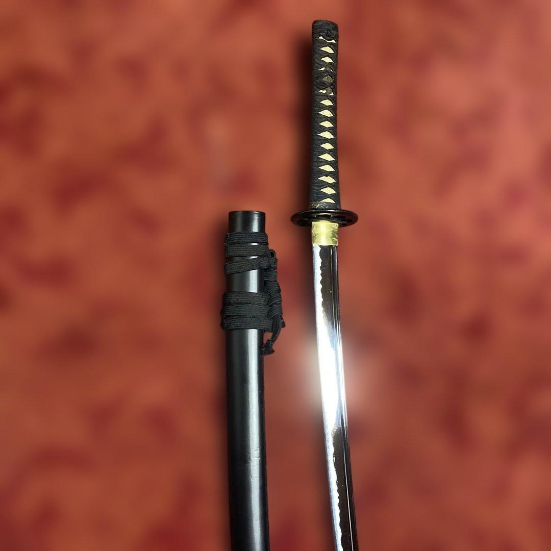 高級居合刀 黒柄 蓮根輪切透し丸鍔 黒呂鞘