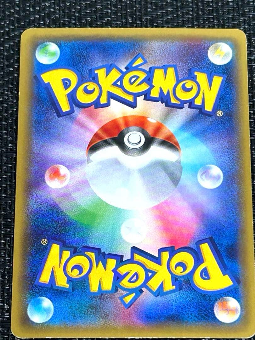 リザードンEX：ユニクロ「ポケモンカードゲームＴシャツ」 PROMO XY ①