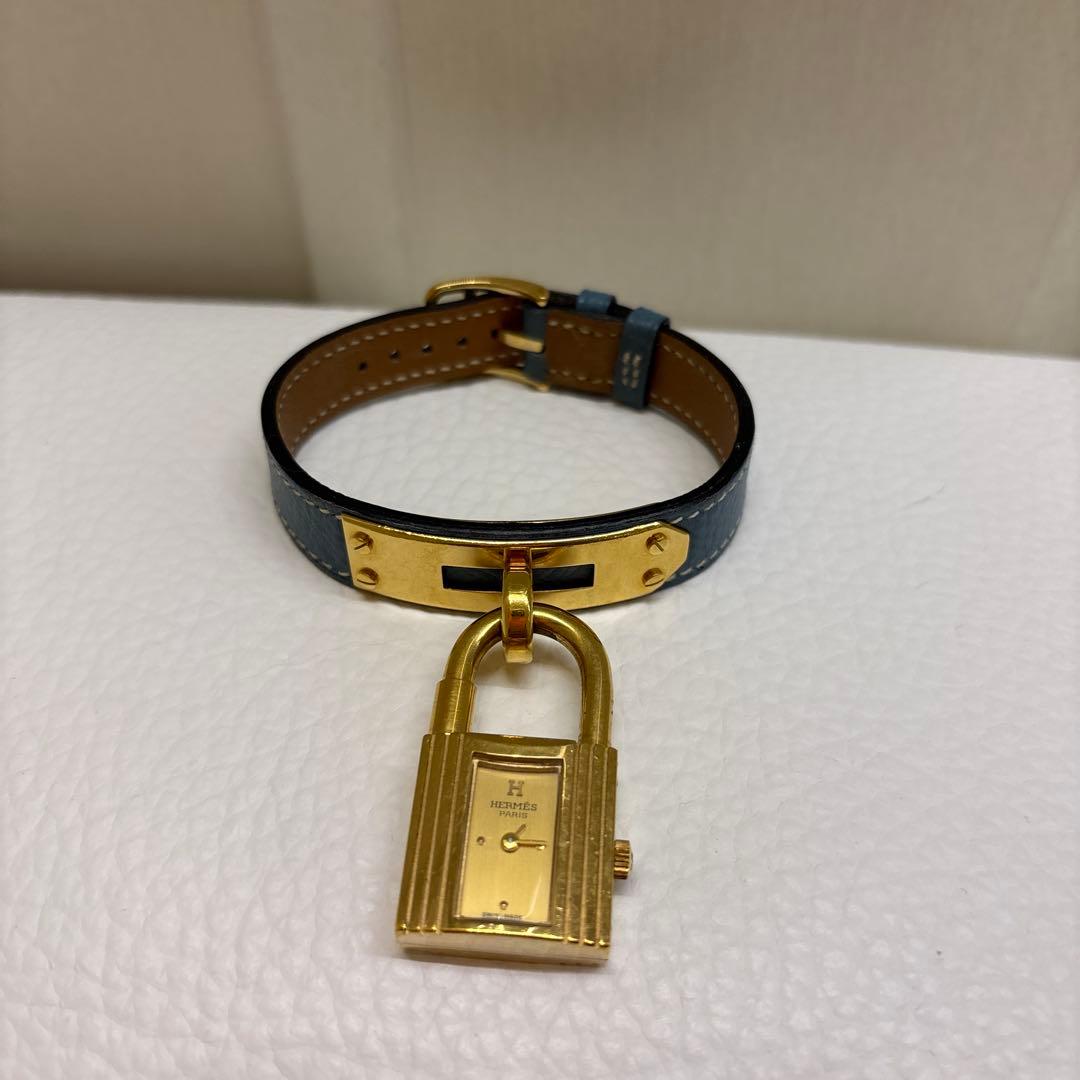 青いレザー 時計 金色ロックデザイン