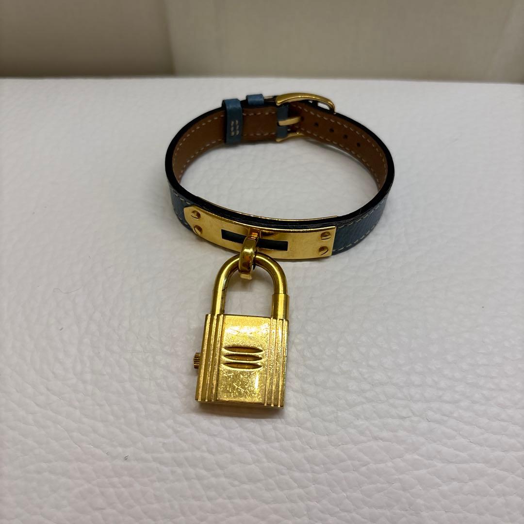 青いレザー 時計 金色ロックデザイン