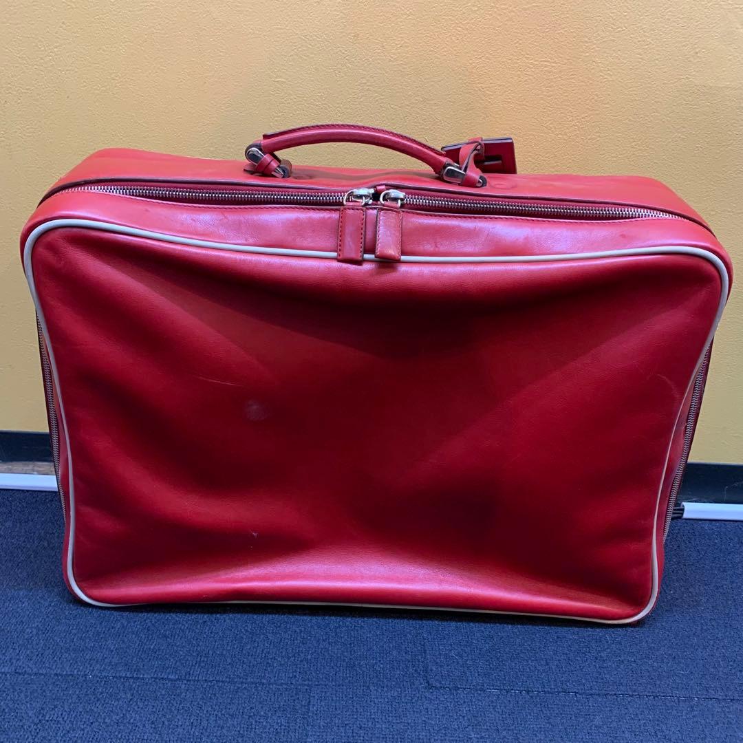 プラダ　PRADA トラベルバッグ　旅行用　スーツケース　赤　レッド　プレート