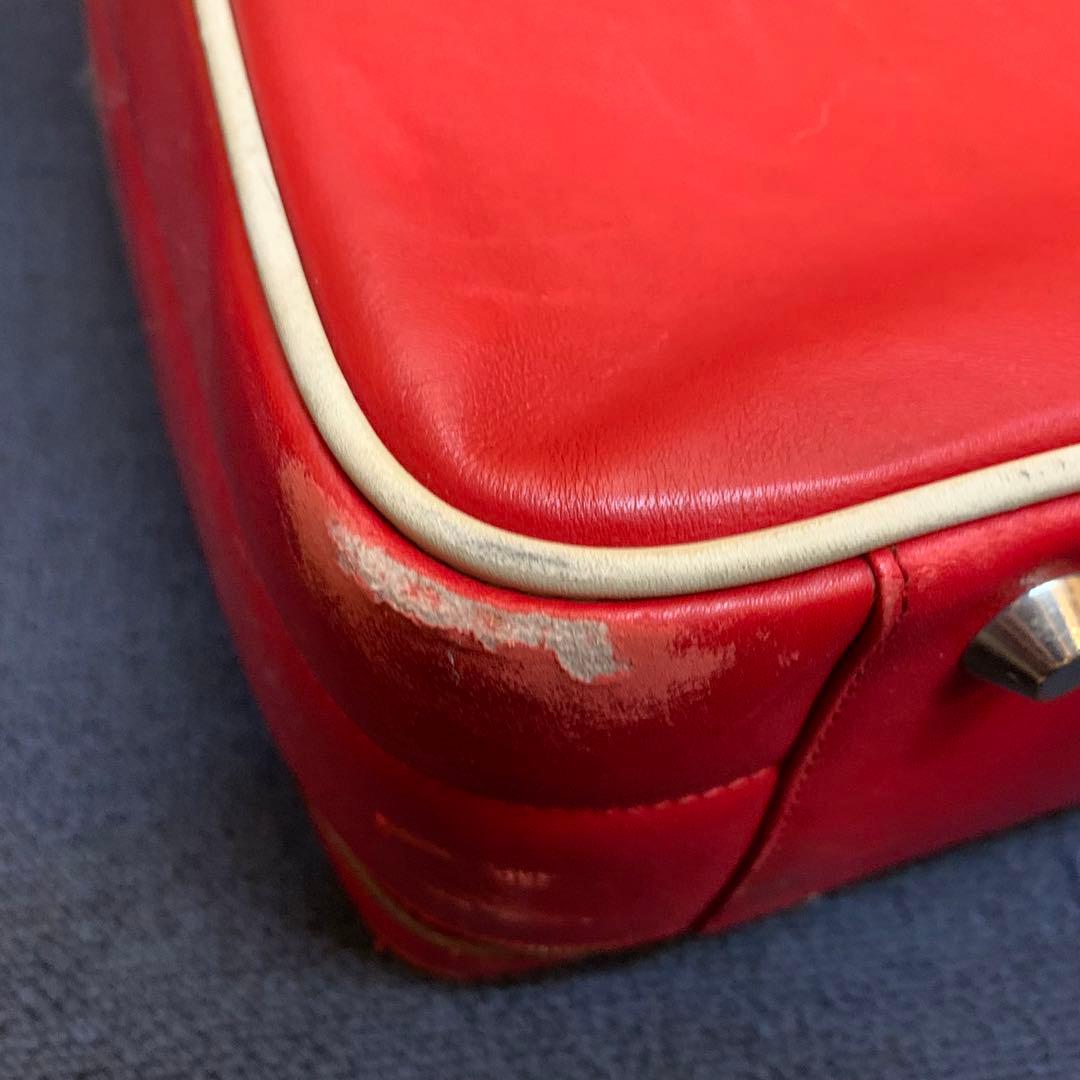 プラダ　PRADA トラベルバッグ　旅行用　スーツケース　赤　レッド　プレート