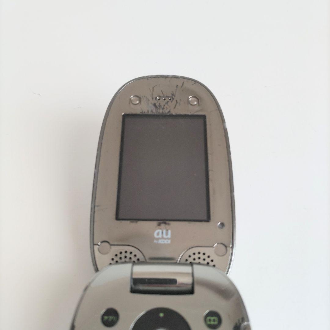 au ガラケー PENCK ペンク W31H メタリック サイトウマコト