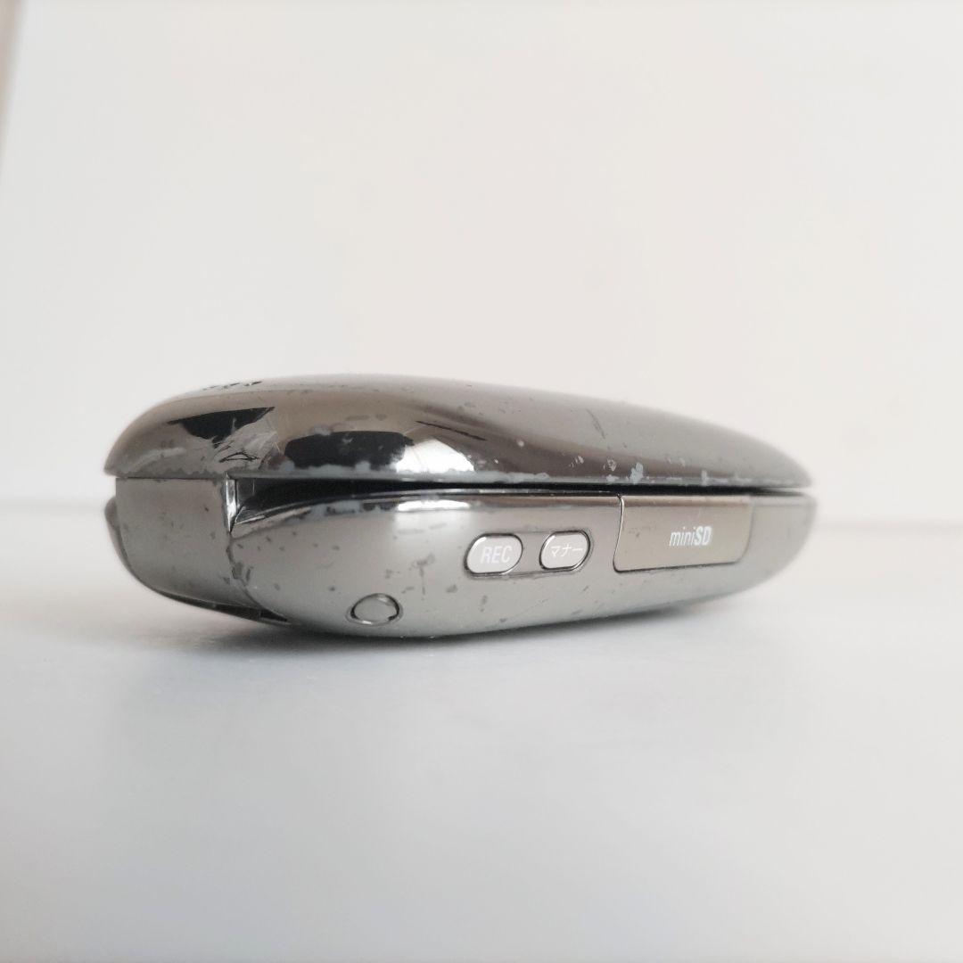 au ガラケー PENCK ペンク W31H メタリック サイトウマコト