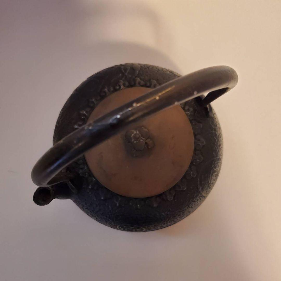 龍文堂　鉄瓶　古銭文様　取手銀象篏