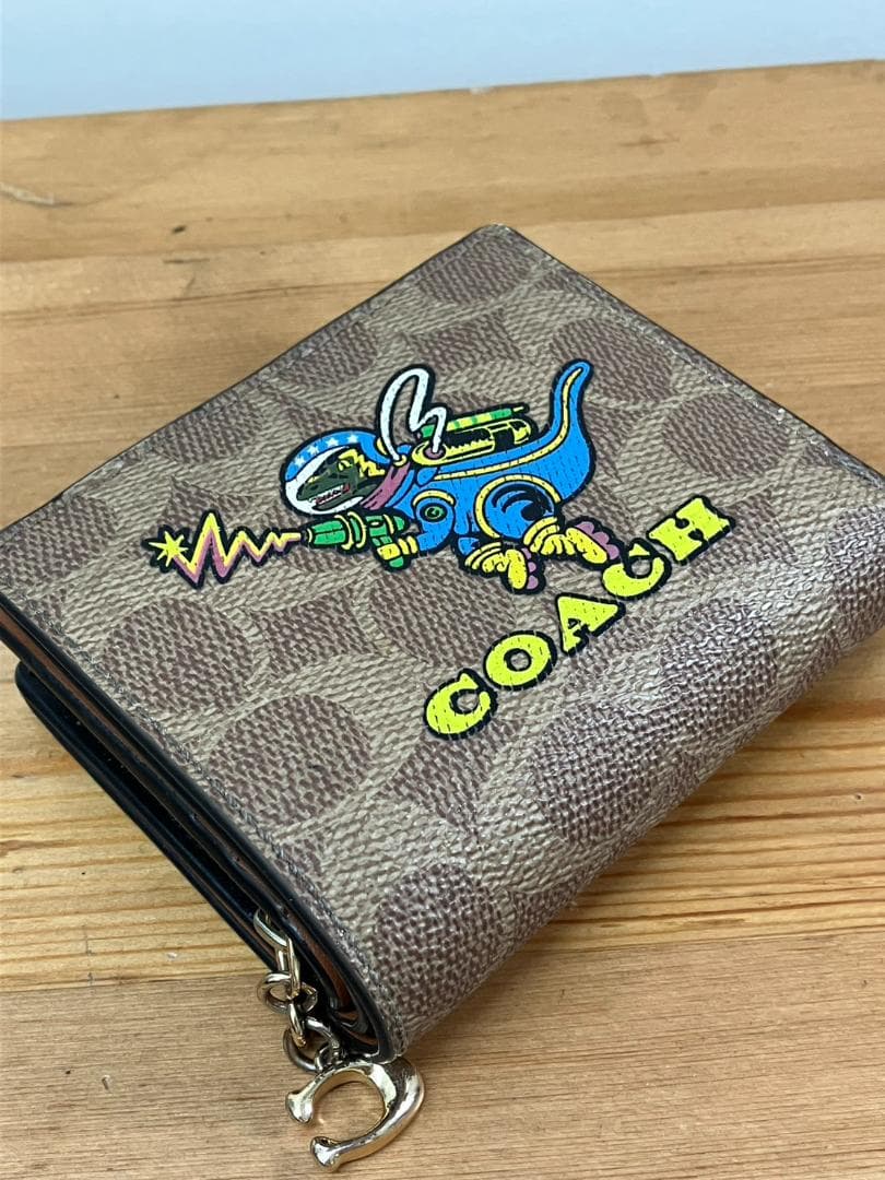 コーチ コズミック レキシー 二つ折り財布 ラウンドジップ 宇宙　CW463