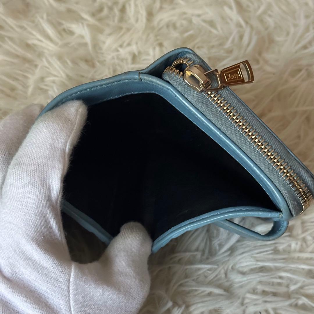 イヴサンローラン 二つ折り財布 型押し レザー ジップ ライトブルー コンパクト