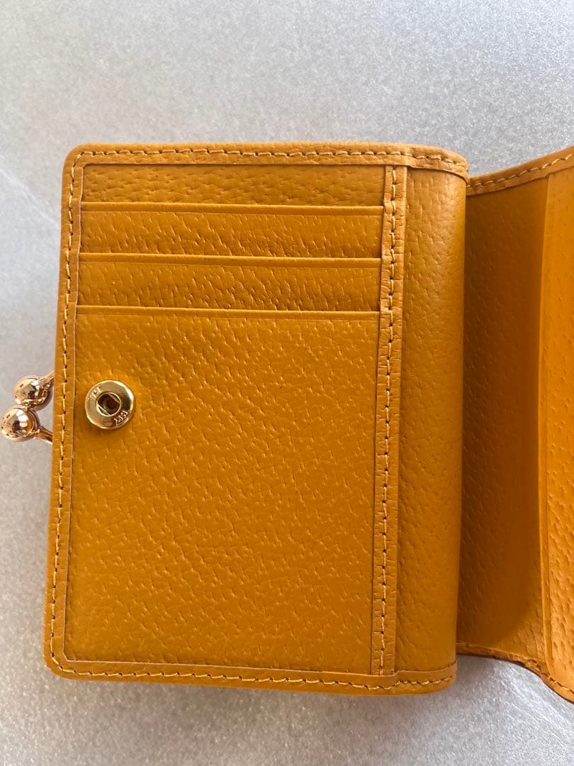 新品未使用品 Vivienne Westwood 二つ折り財布 イエロー