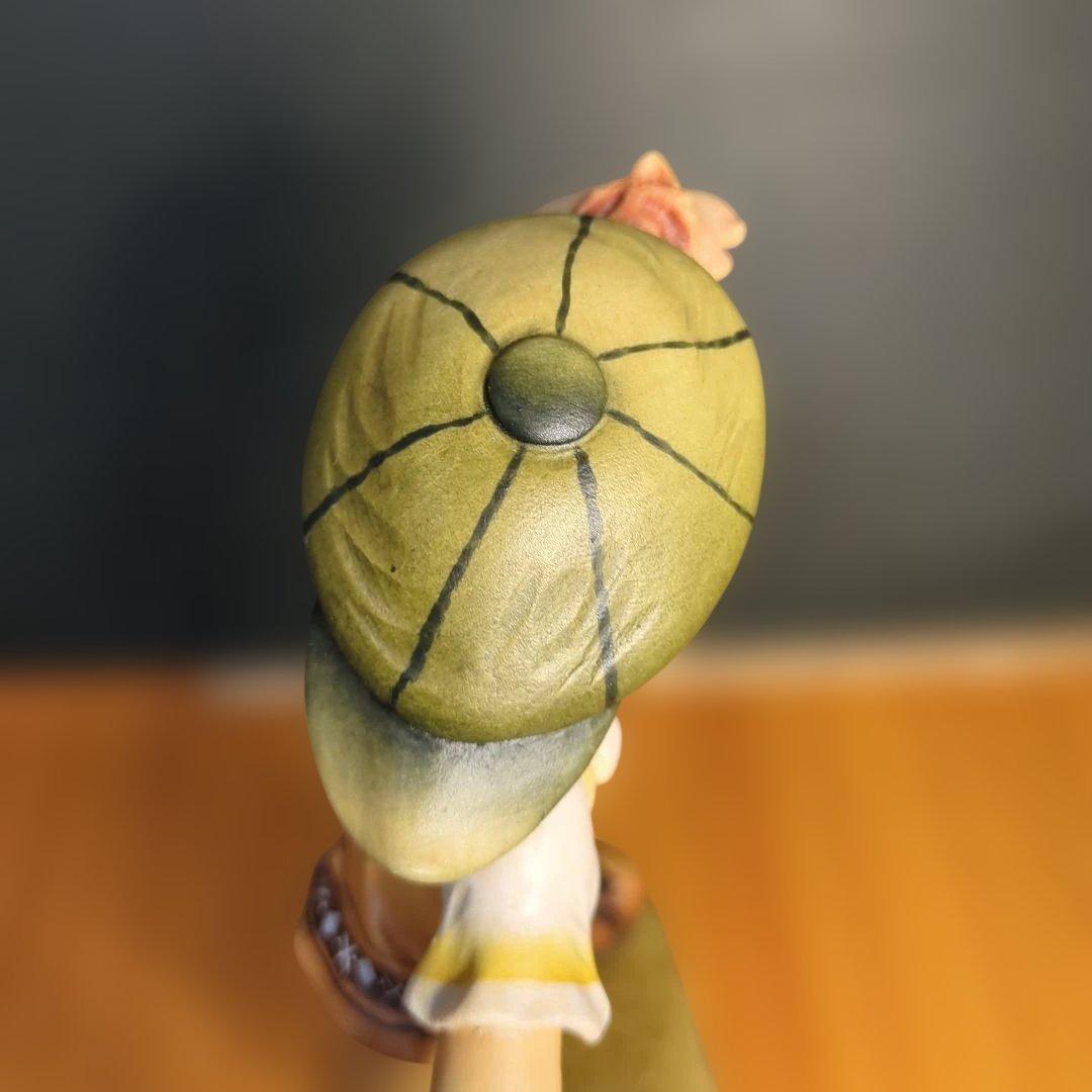 イタリア　アンリ社　木彫りの人形 ゴルフ少年　という作品