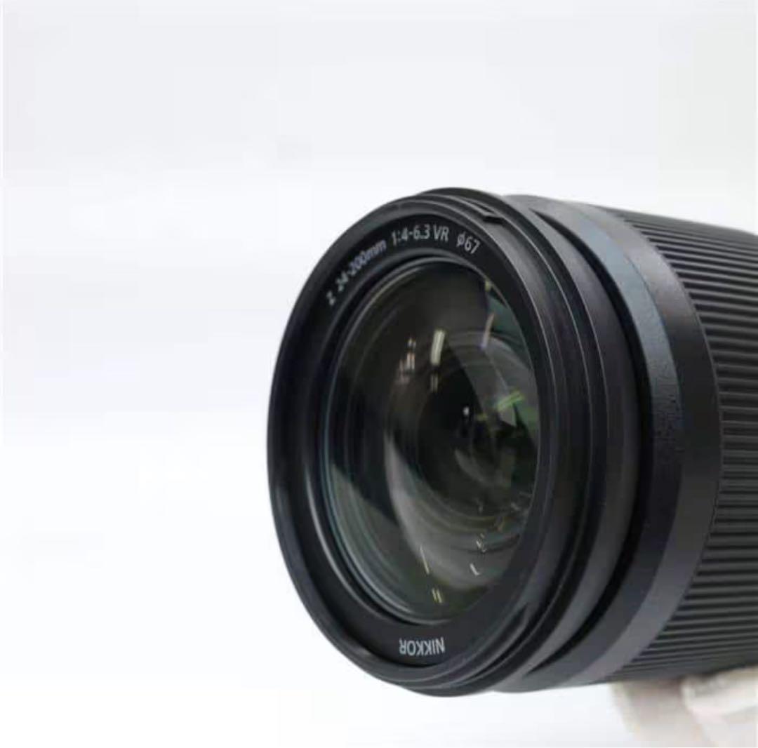 Nikon z 24-200 新古品　フード　保護フィルター付き